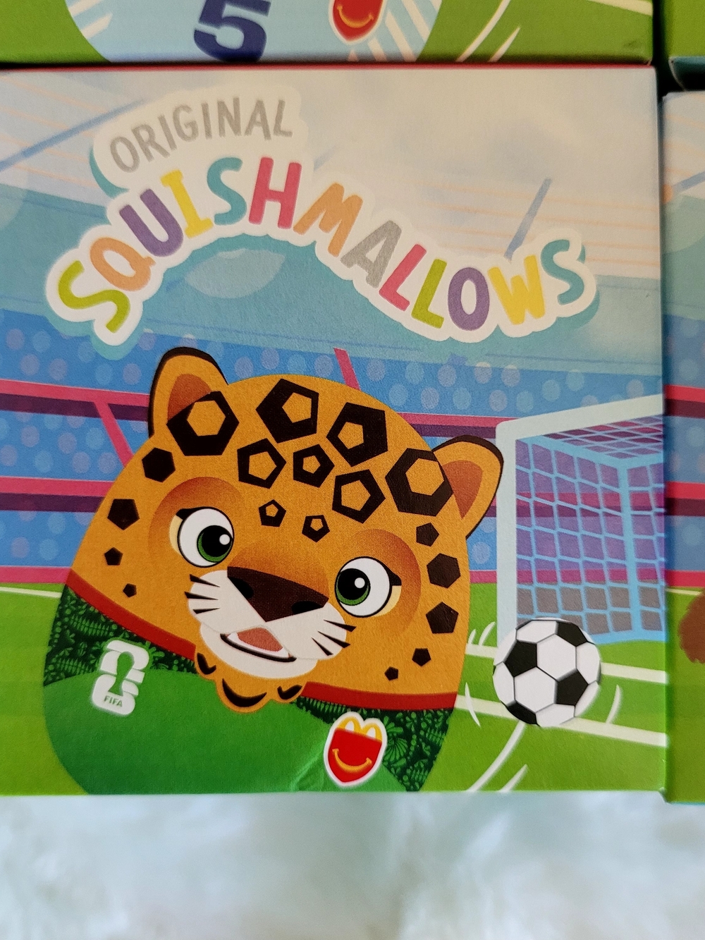 Mcdonald's Fifa 2026 Squishmallows Orange and Green Soccer Leopard Plush Box Art
